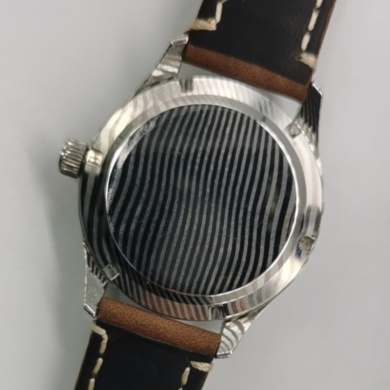 Automatic mechanical Damascus watch