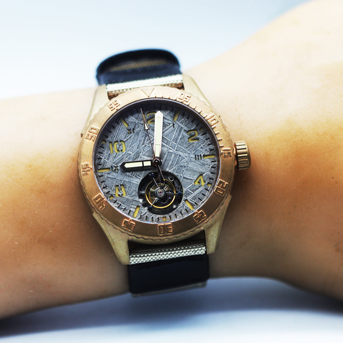 Automatic coaxial tourbillonarched bronze watch